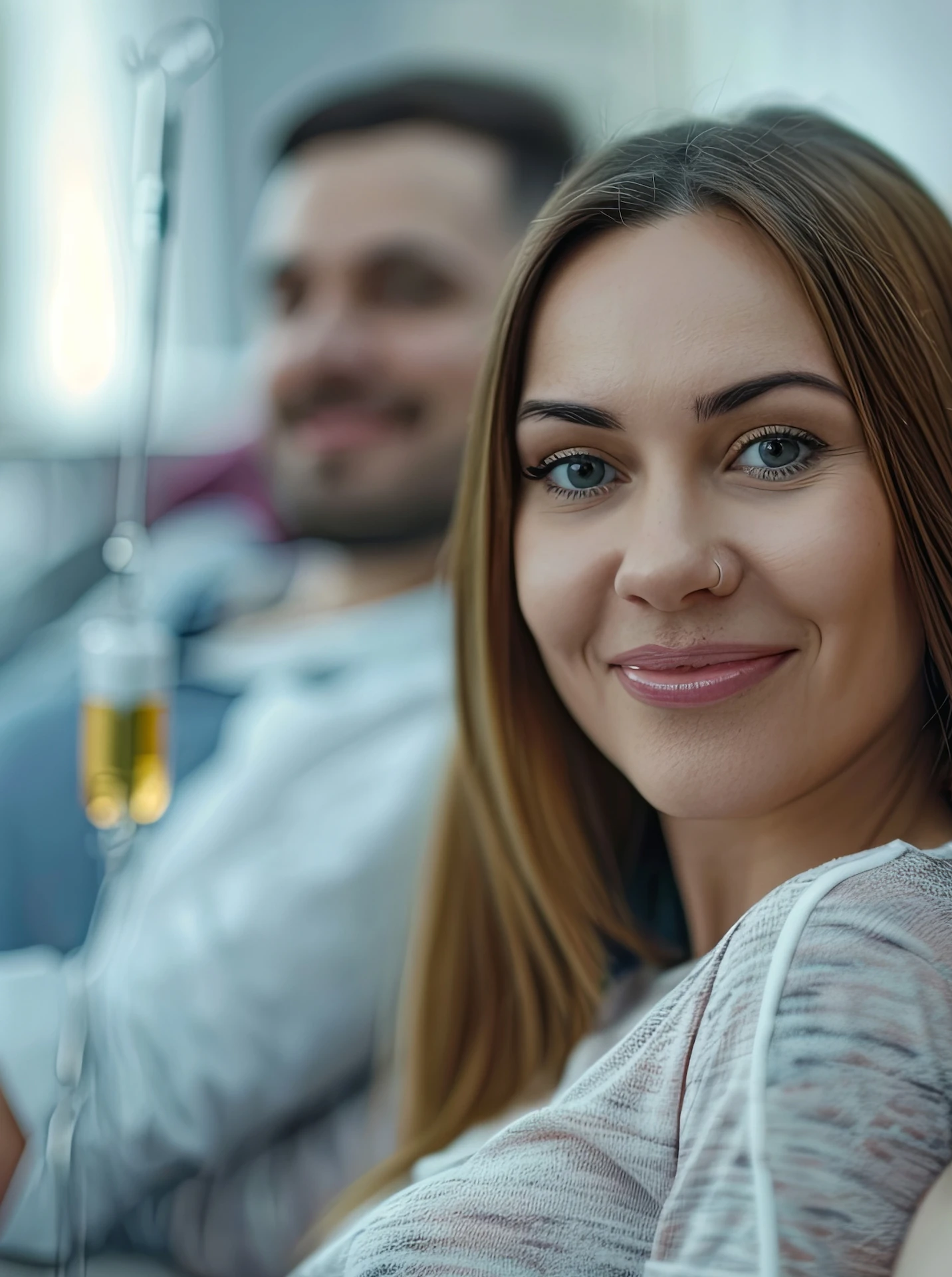 man and woman sitting together