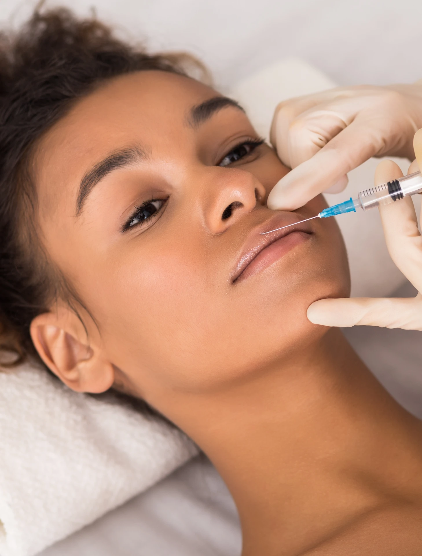 woman having an injection in her lip