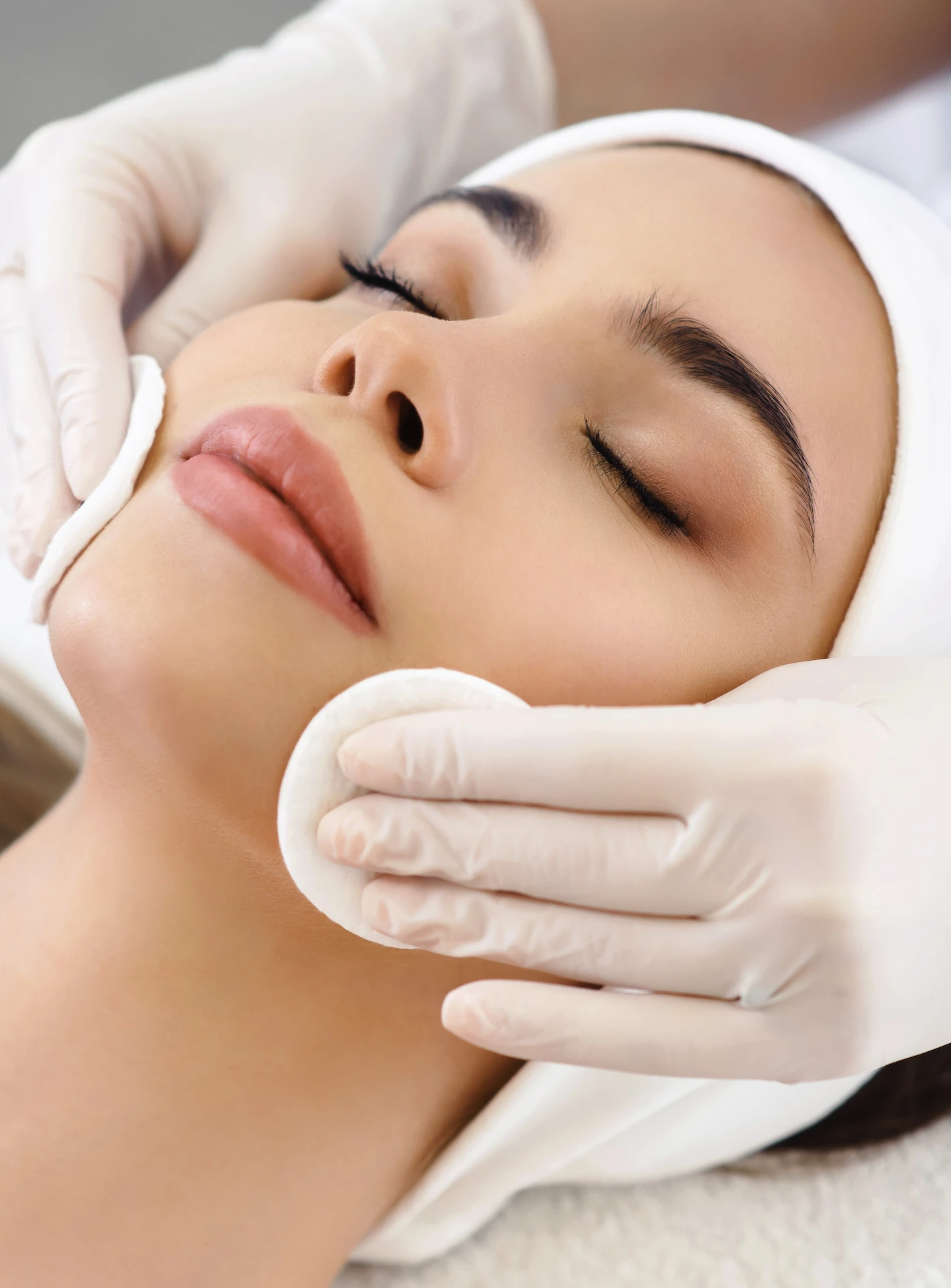 woman having treatment on the bottom of her chin
